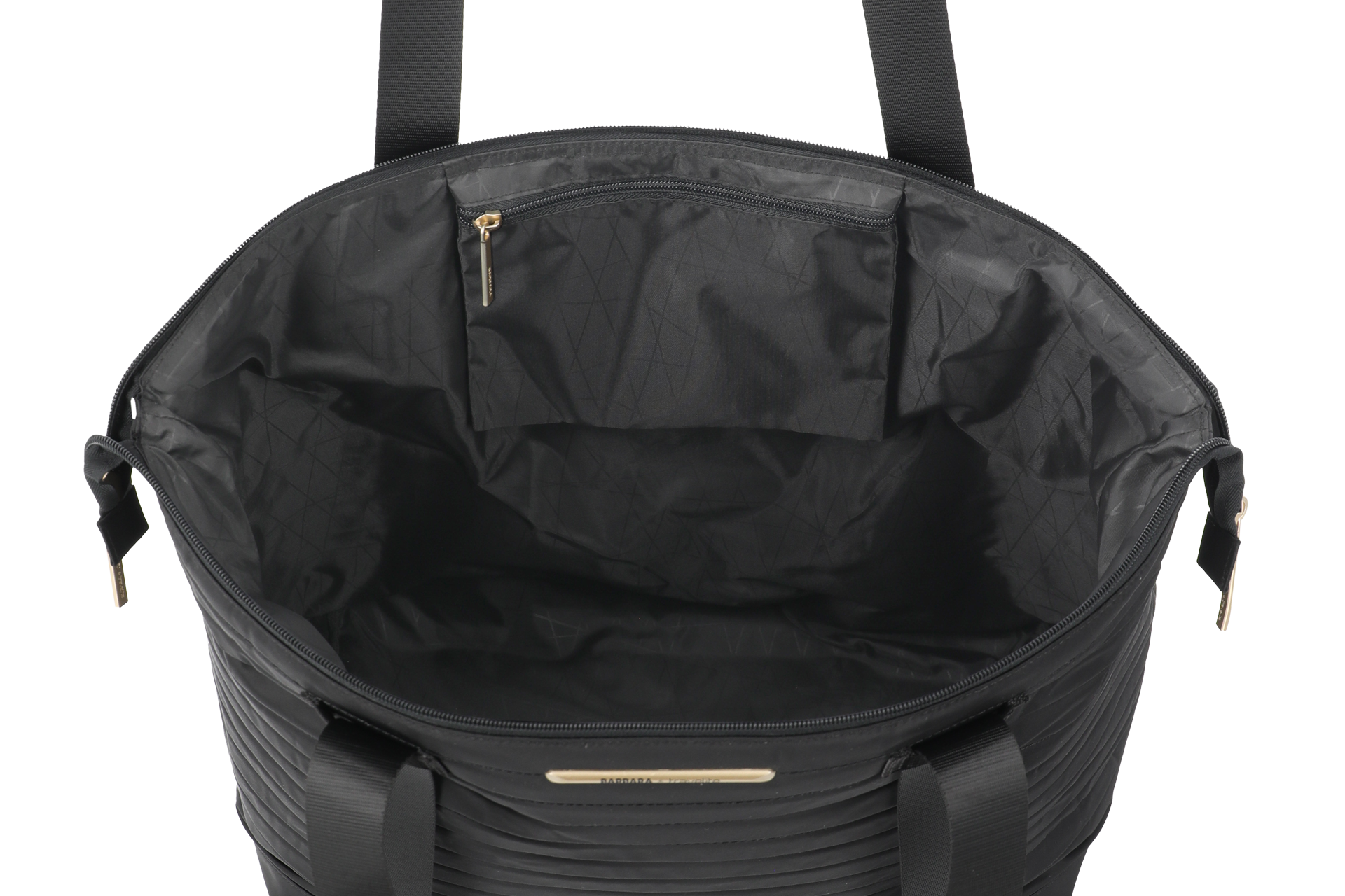 Großer, geräumiger Innenraum einer schwarzen Tasche mit Reißverschluss und Innenfach Innenansicht einer schwarzen Tasche mit Reißverschluss und zusätzlichem Innenfach