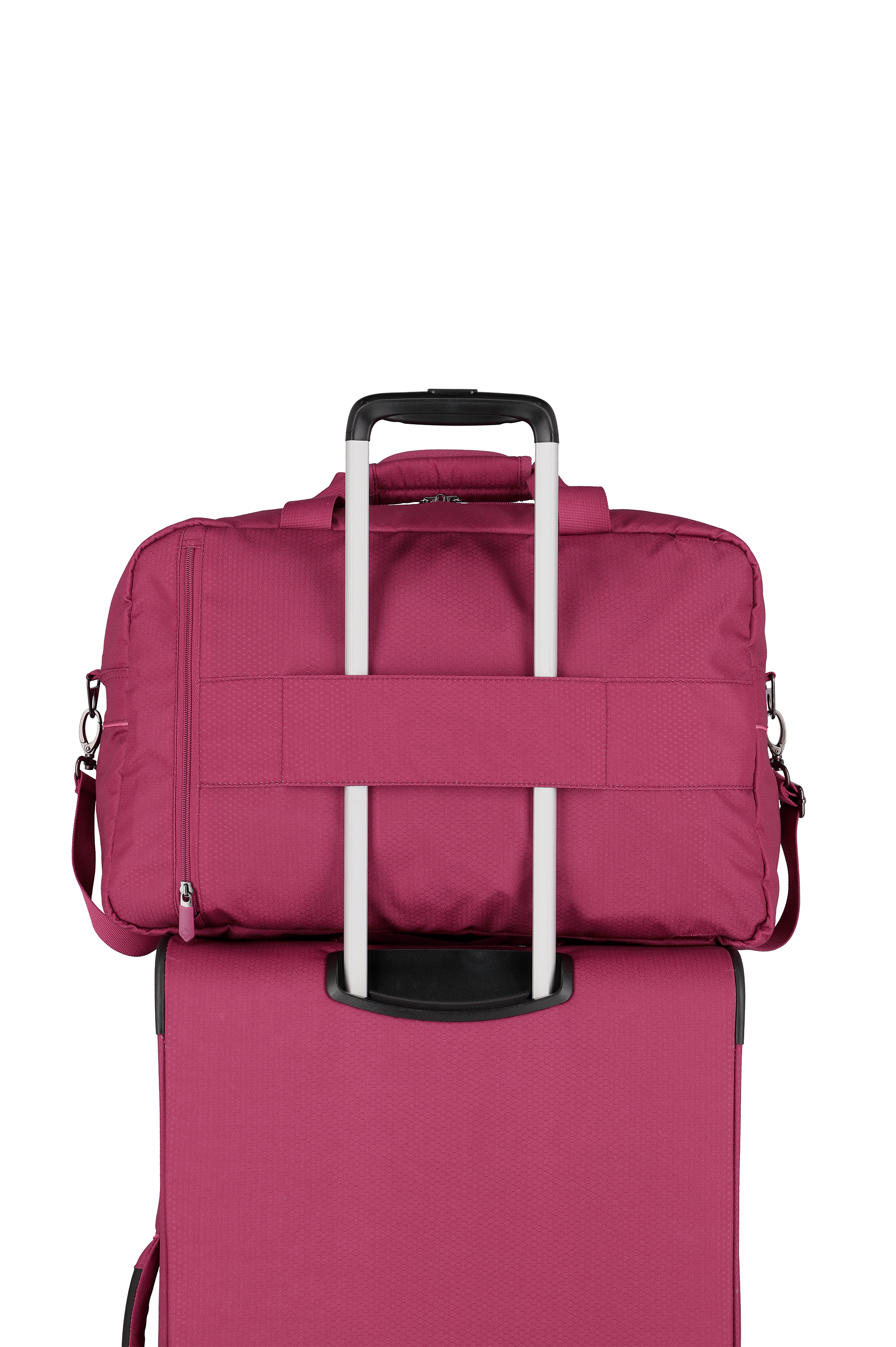 Bordeauxfarbene Reisetasche auf Trolley-Koffer mit Teleskopgriff