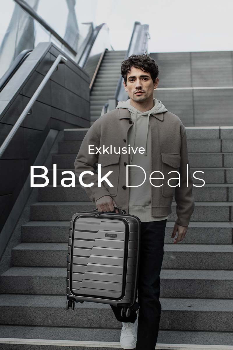 Mann auf Treppe mit modernem Rollkoffer, exklusive Black Deals