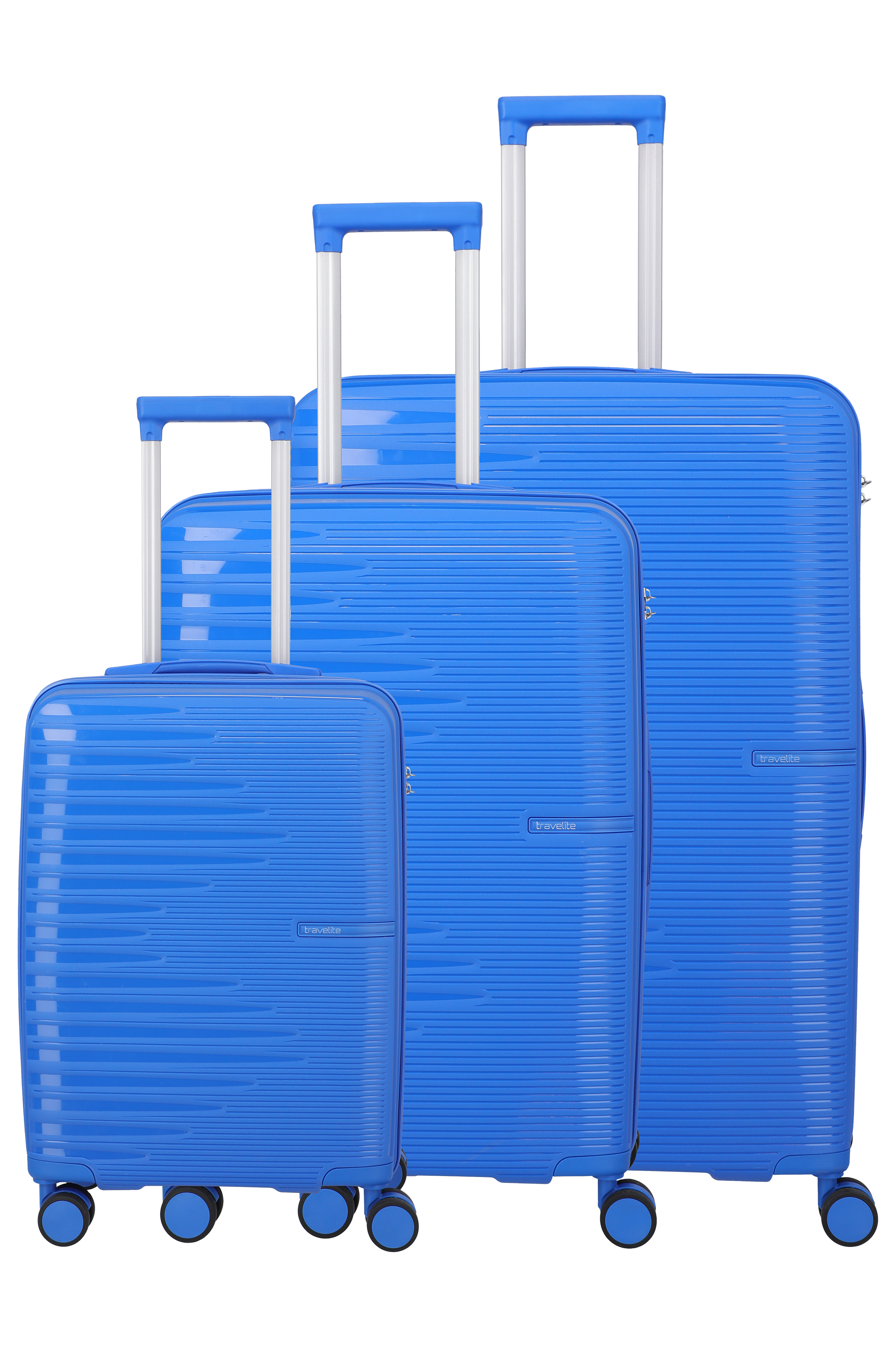 Three blue "Travelite" brand suitcases in different sizes stand against a black background. Each has an extendable, silver-coloured handle with a blue grab handle and four wheels. The case is decorated with horizontal lines.
