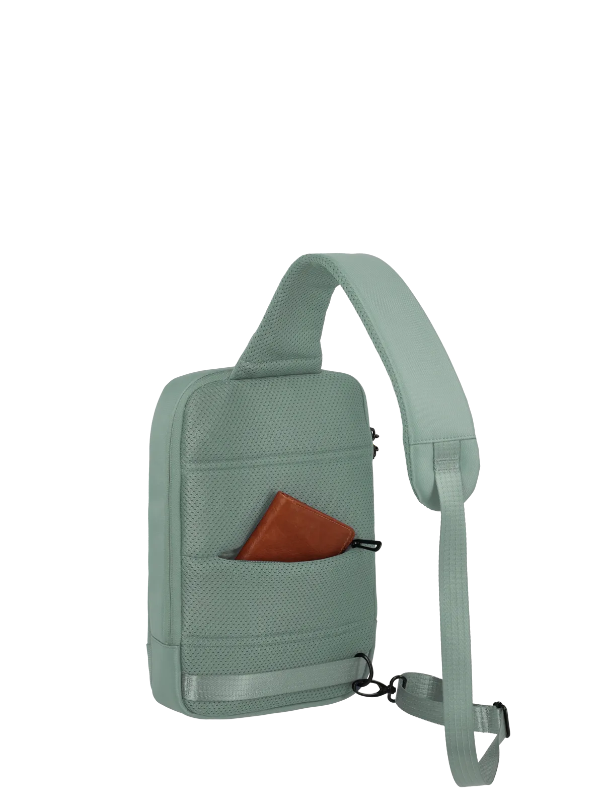 Hellgrüne Sling Bag mit verstellbarem Schultergurt und Außentasche, darin ein braunes Portemonnaie