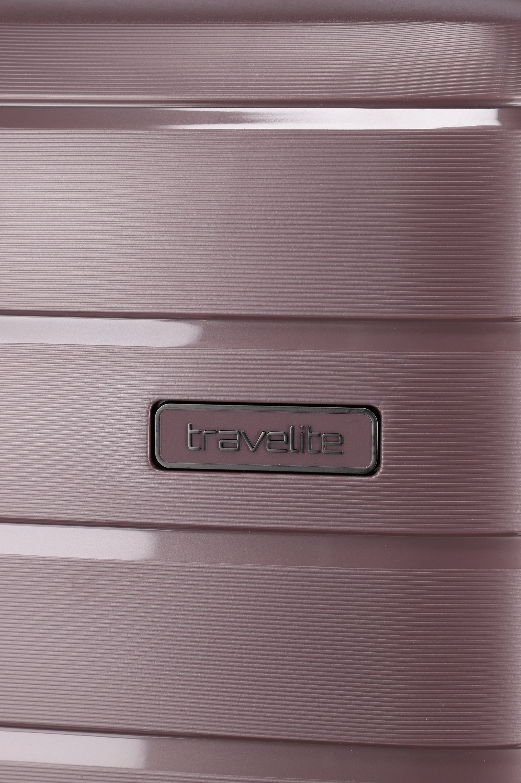 Detailansicht eines Reise-Koffers von Travelite in Rosé mit strukturiertem Hartschalen-Design