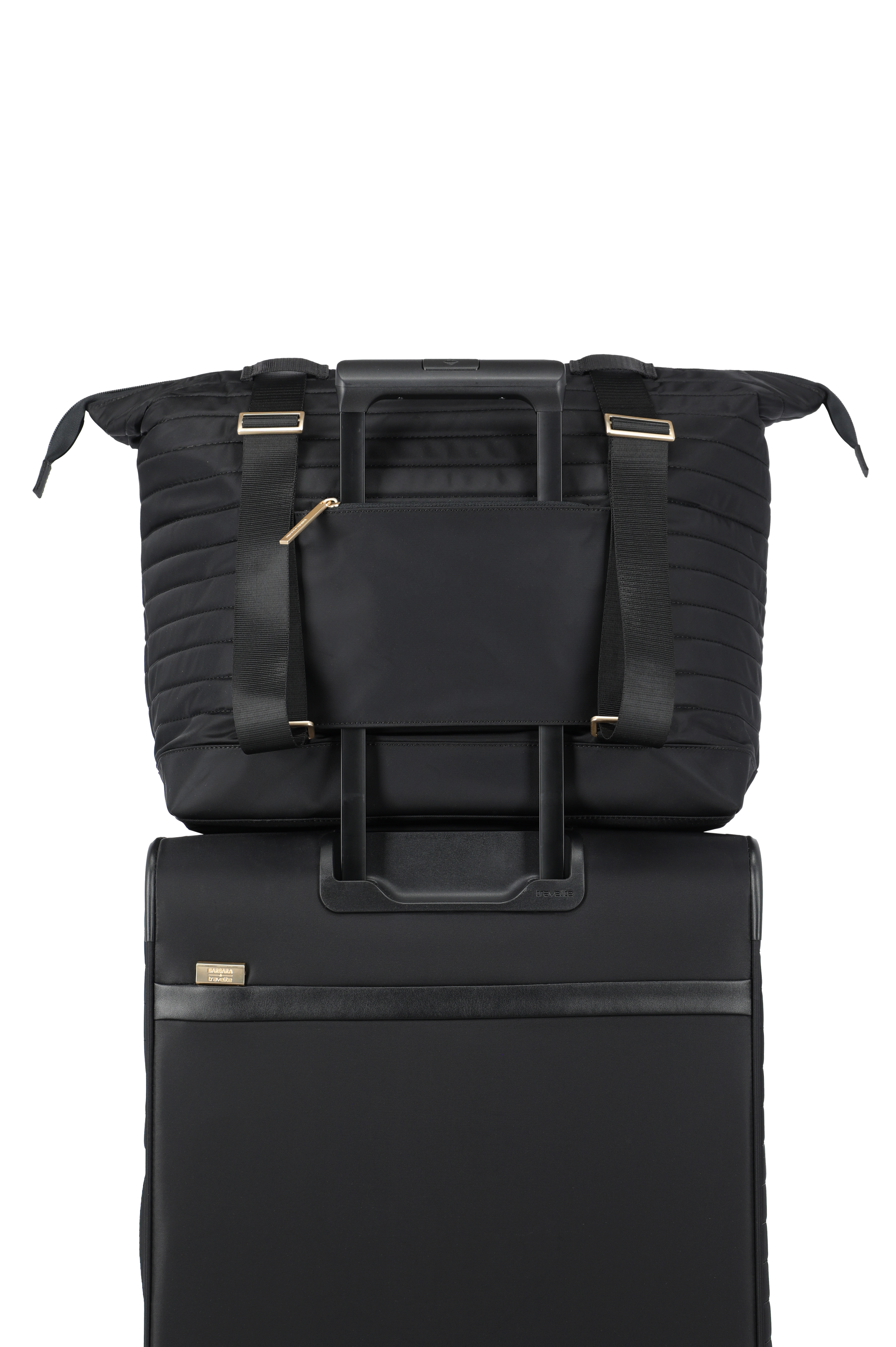 Schwarze Reisetasche mit Trolley-Aufsteckfunktion auf Rollkoffer