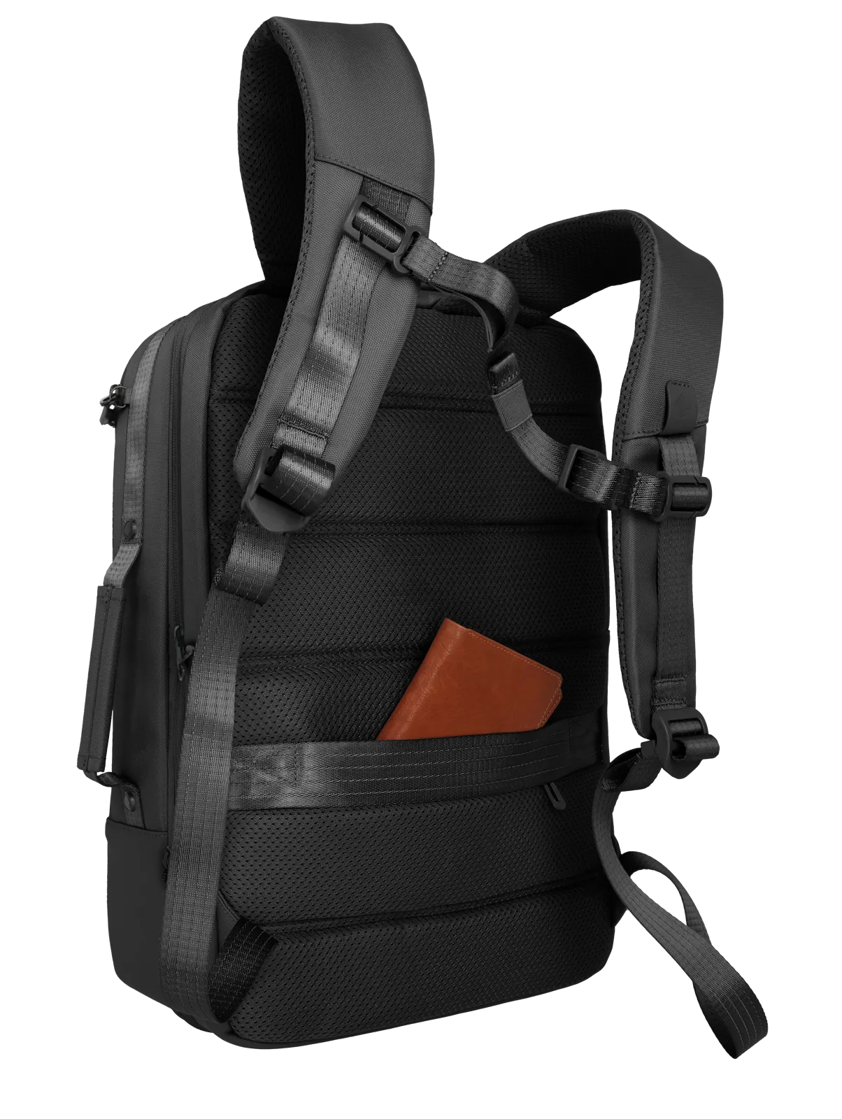 Schwarzer Rucksack mit braunem Notizbuch in der Rückenpolstertasche